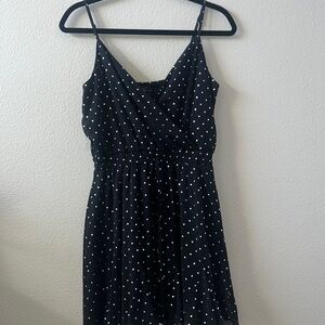 Black mini dress with silver polka dots. Size med NWT